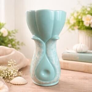 Vintage aqua ceramic vase with crackle drip glaze, elegant sculptural form.